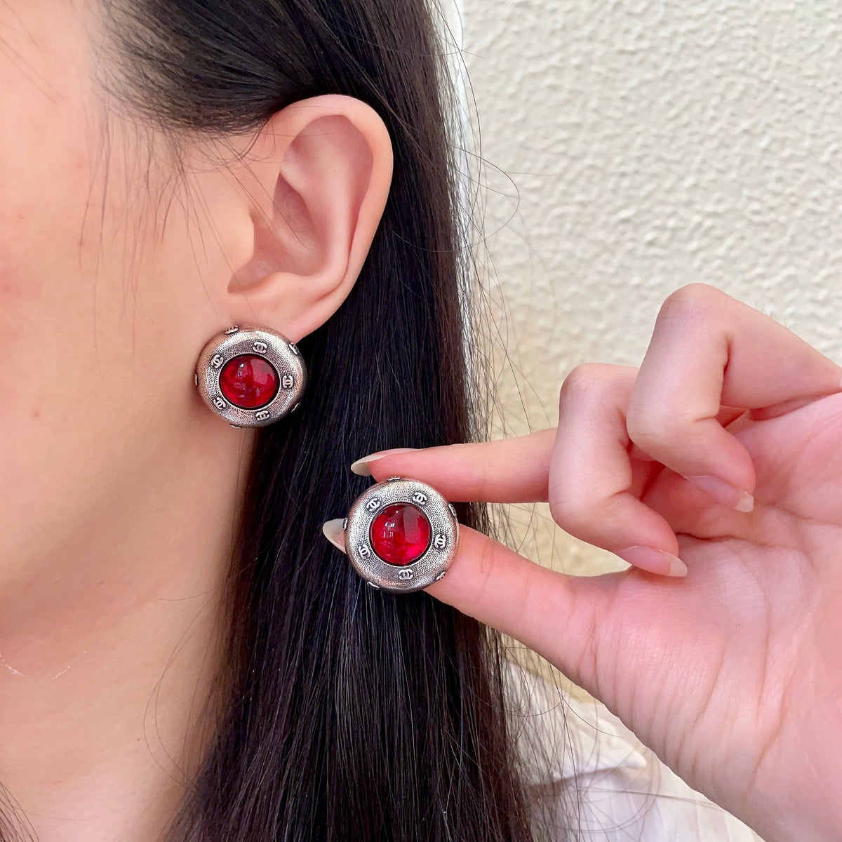 Chanel Interlocking C Stud Earrings - album image 1