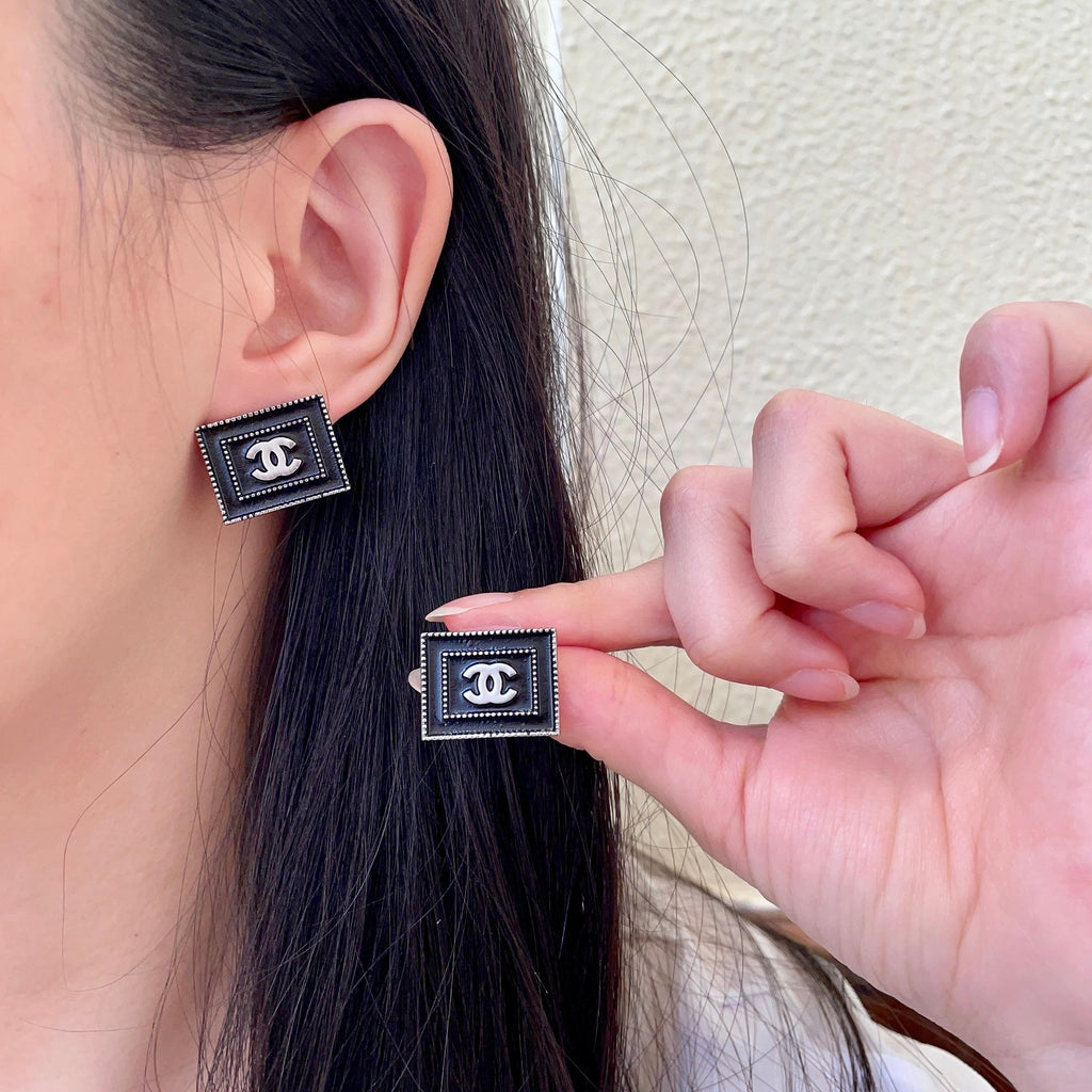 Chanel Interlocking C Stud Earrings - album image 1