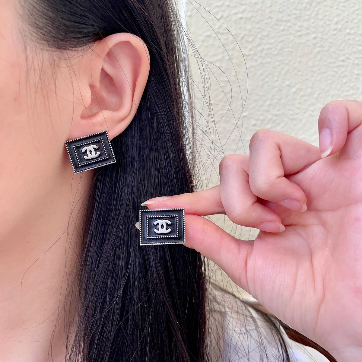 Chanel Interlocking C Stud Earrings - album image 1