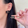 Chanel Interlocking C Stud Earrings - album image 1