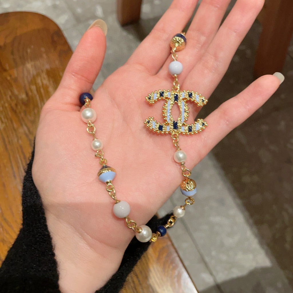 Chanel Interlocking C Pearl Necklace - album image 6