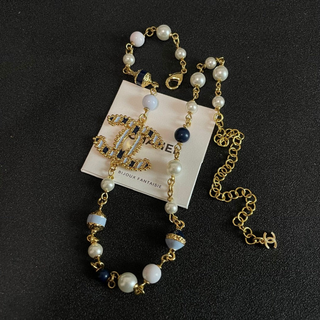 Chanel Interlocking C Pearl Necklace - album image 11