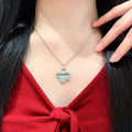 Chanel Camellia Letter Necklace - album image 1