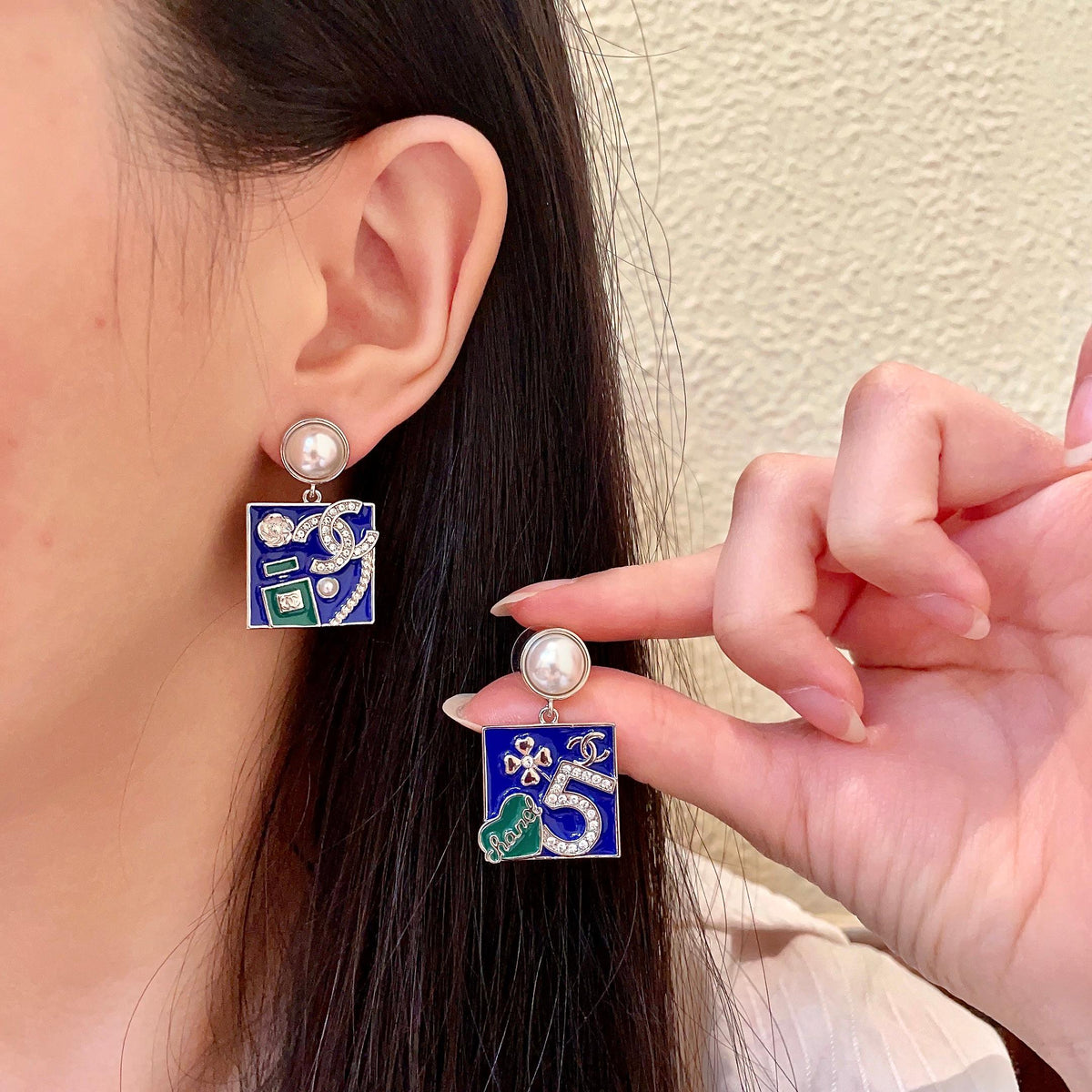 Chanel Interlocking C Asymmetric Earrings - album image 1