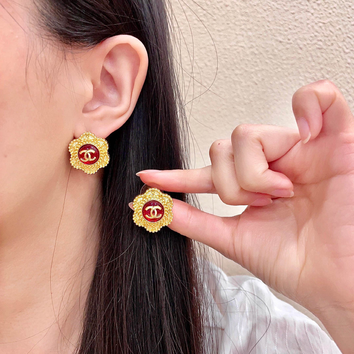 Chanel Interlocking C Stud Earrings - album image 1