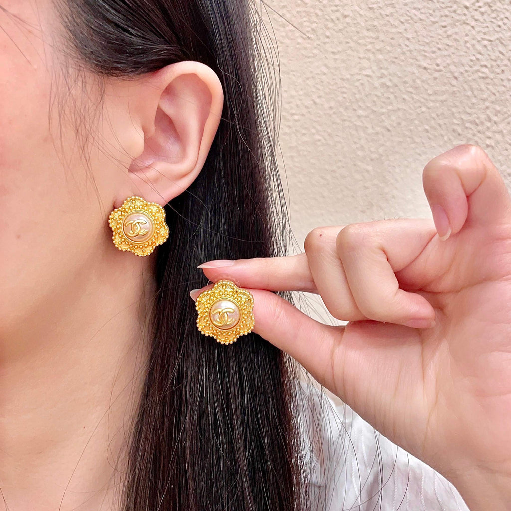 Chanel Interlocking C Stud Earrings - album image 1