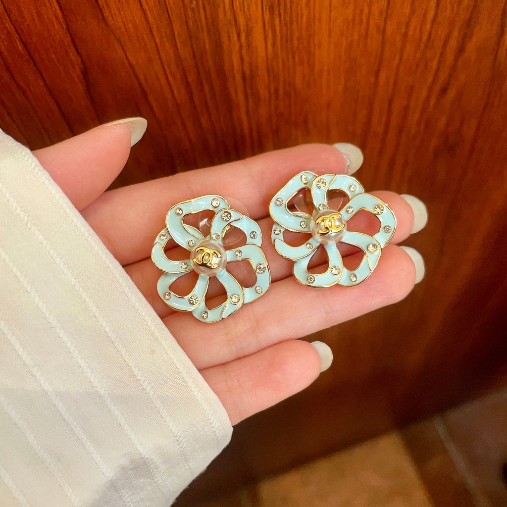 Chanel Interlocking C Camellia Openwork Stud Earrings - album image 4