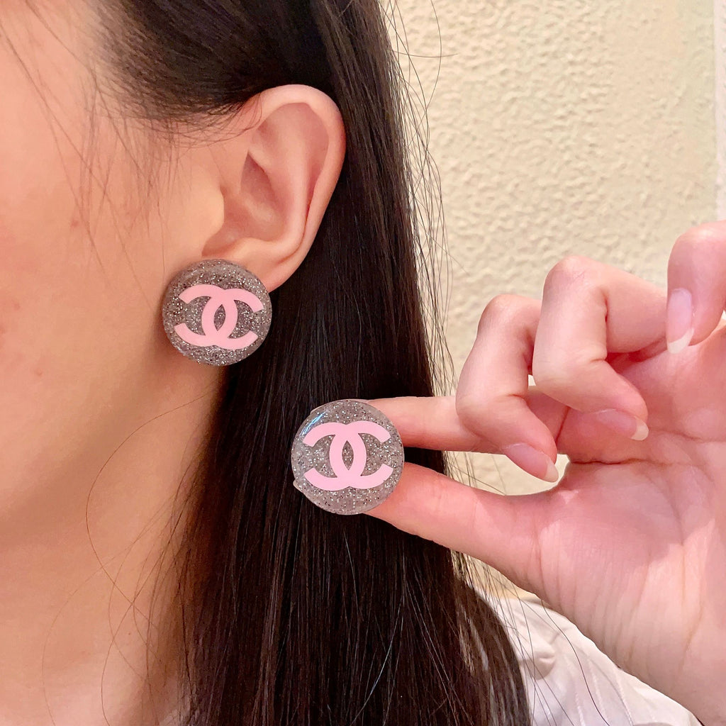 Chanel Interlocking C Stud Earrings - album image 1