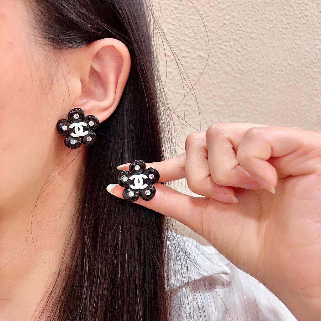 Chanel Interlocking C Camellia Stud Earrings - album image 1