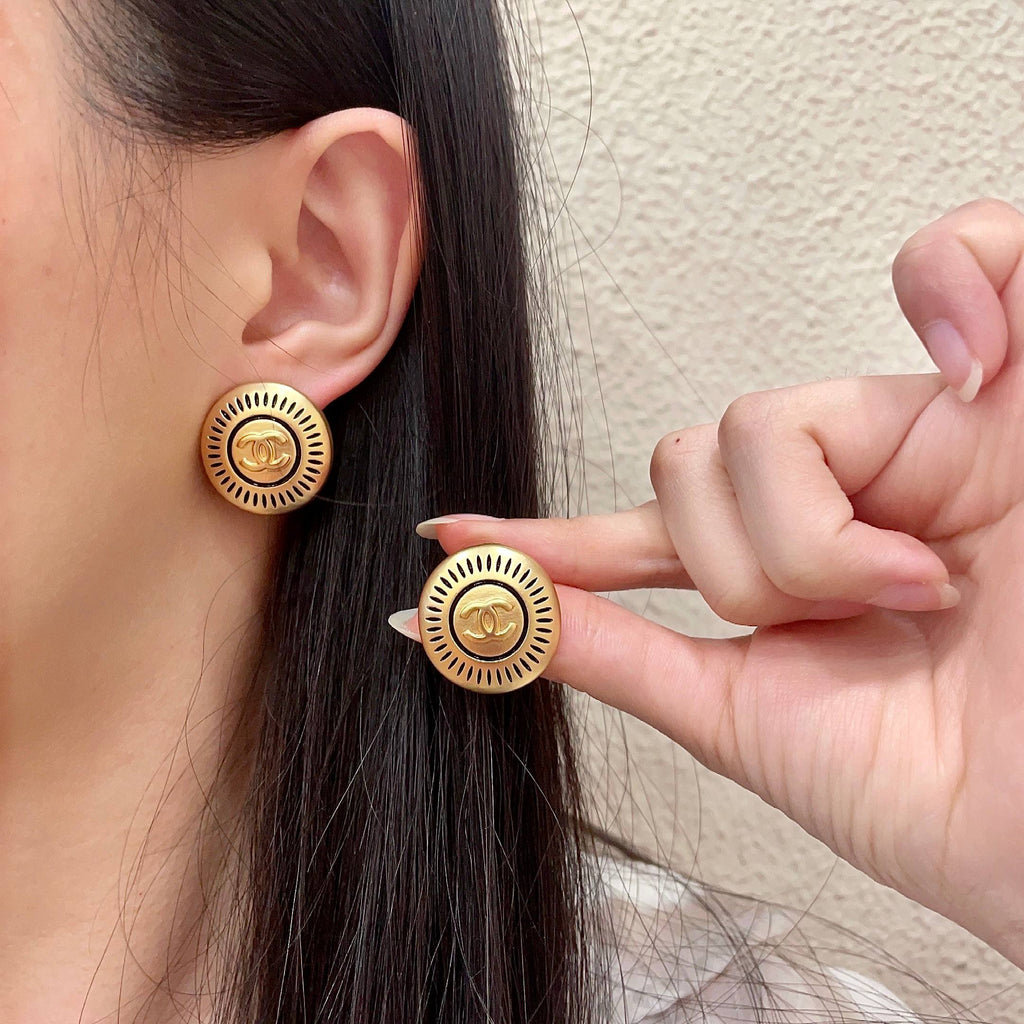 Chanel Interlocking C Stud Earrings - album image 1