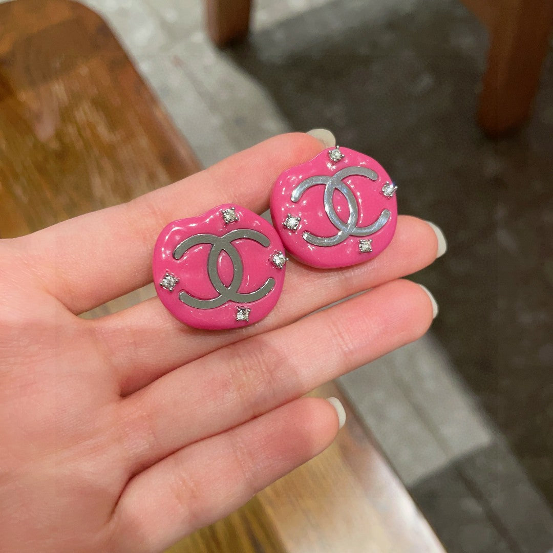 Chanel Interlocking C Stud Earrings - album image 1