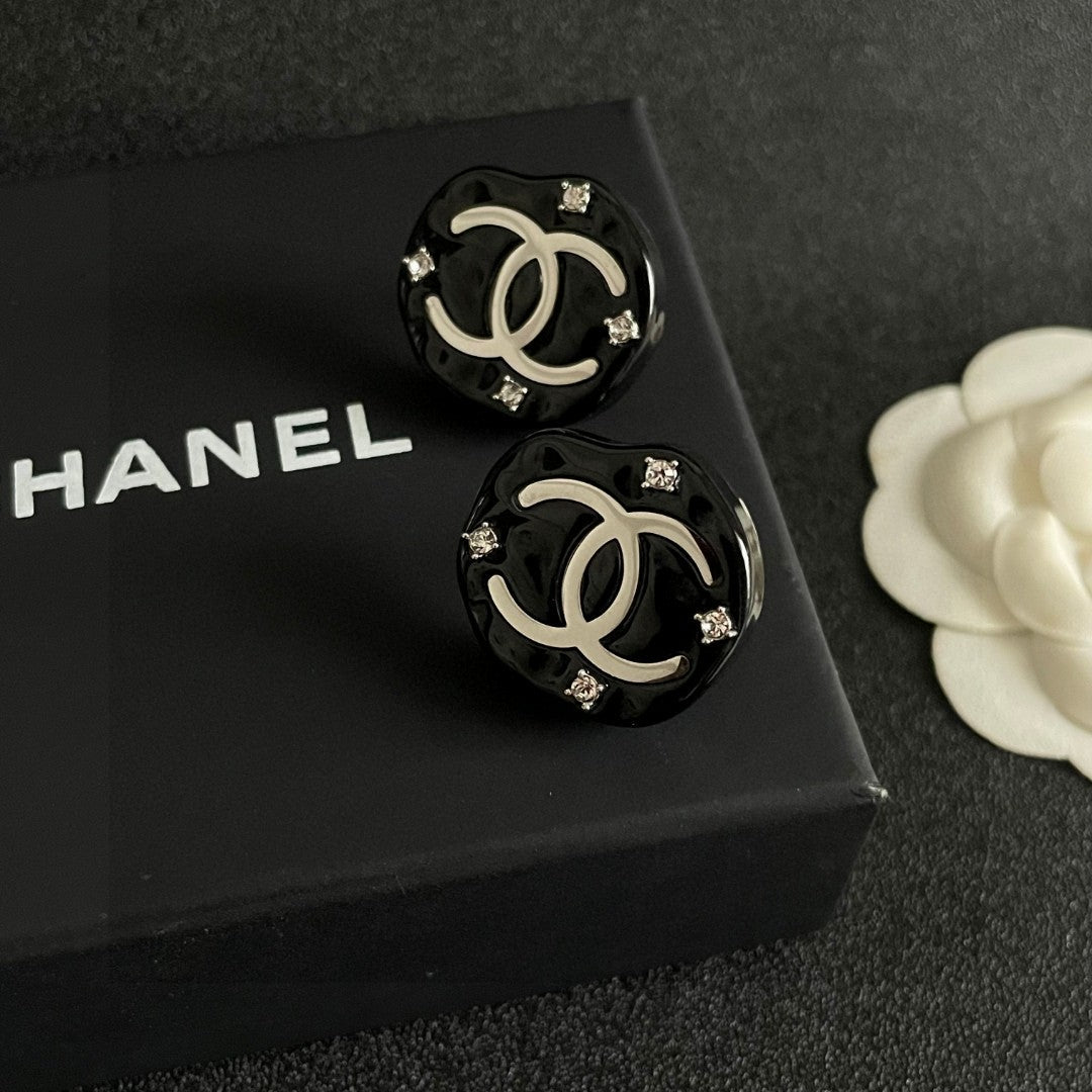 Chanel Interlocking C Stud Earrings - album image 9
