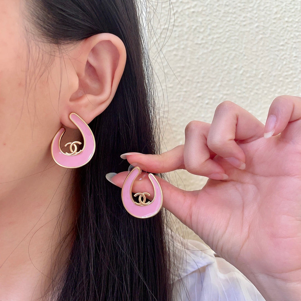 Chanel Interlocking C Stud Earrings - album image 1