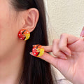 Chanel Interlocking C Multicolor Stud Earrings - album image 1