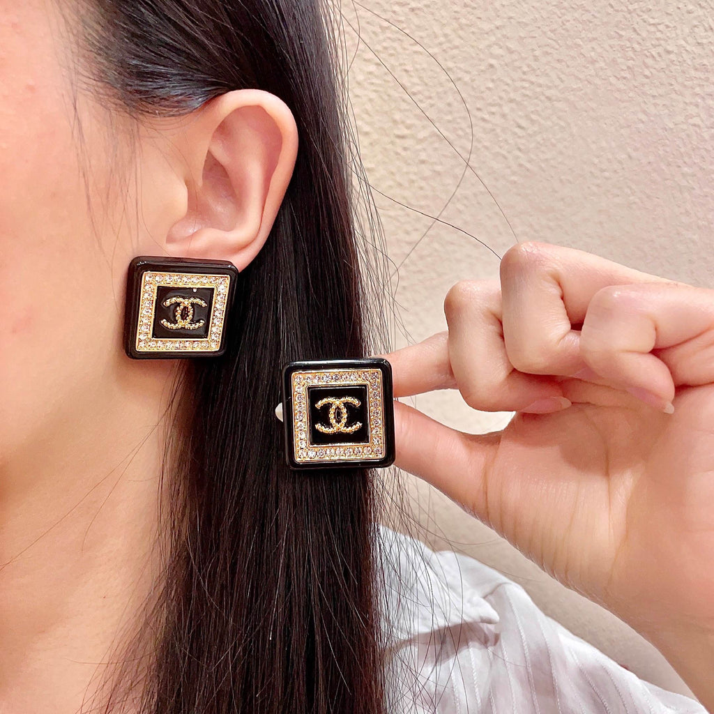 Chanel Interlocking C Stud Earrings - album image 1