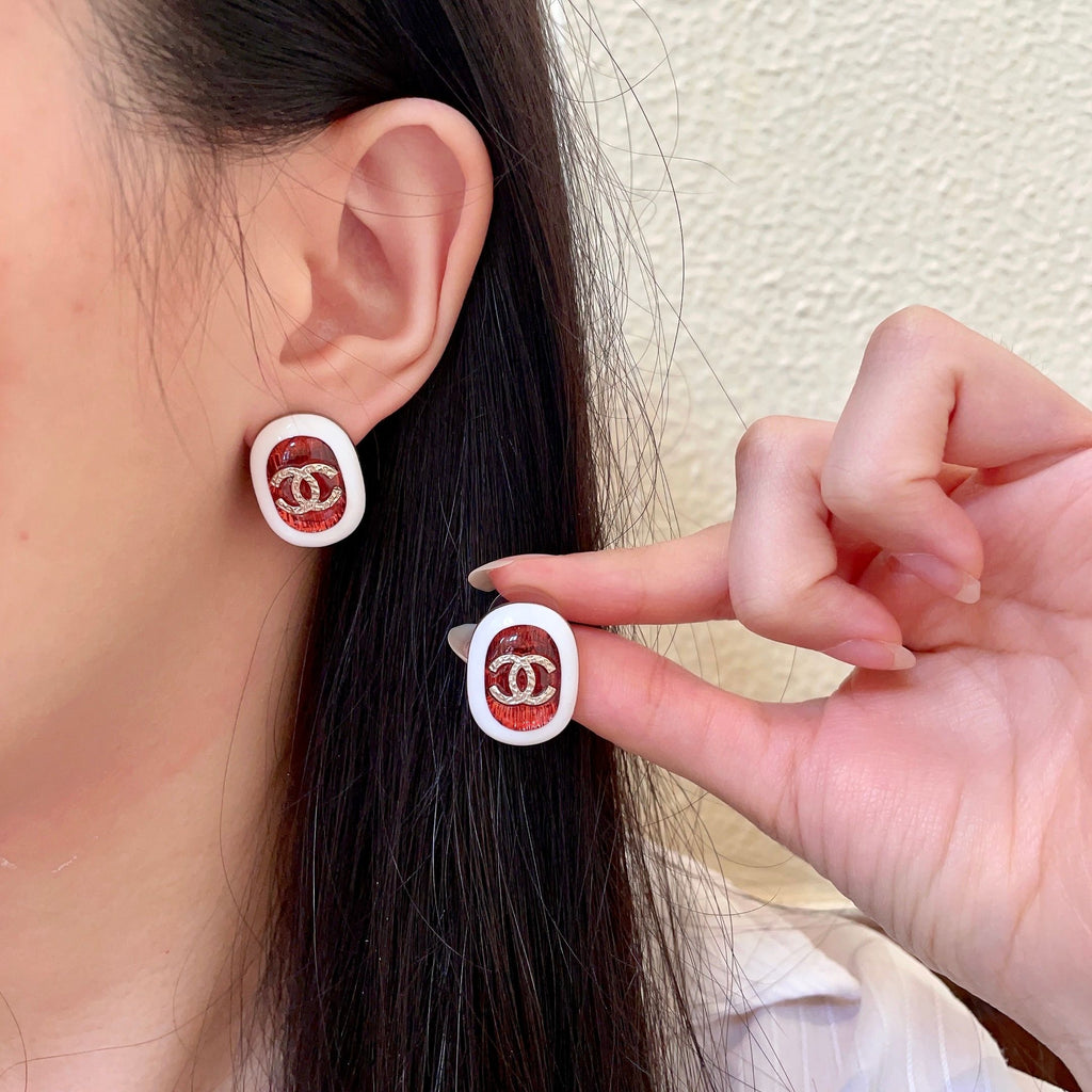 Chanel Interlocking C Stud Earrings - album image 1