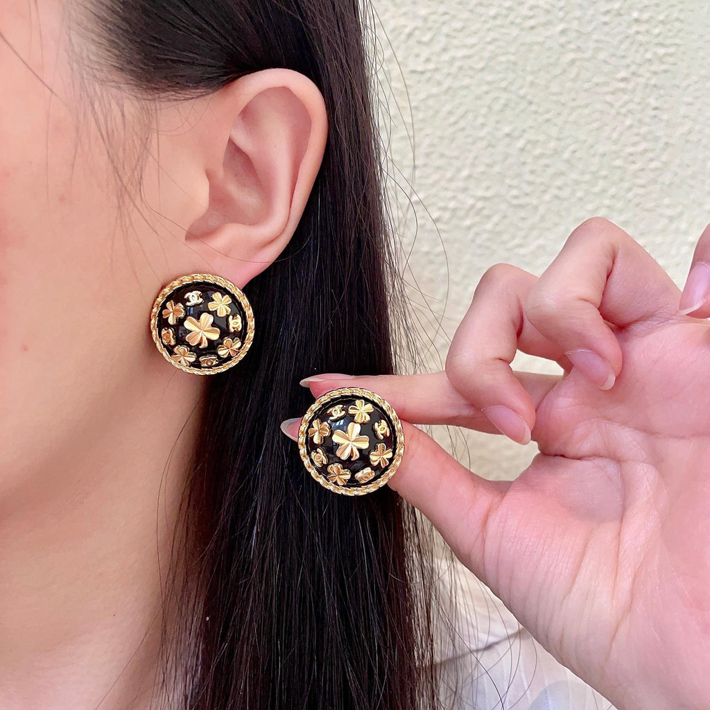 Chanel Interlocking C Camellia Stud Earrings - album image 1