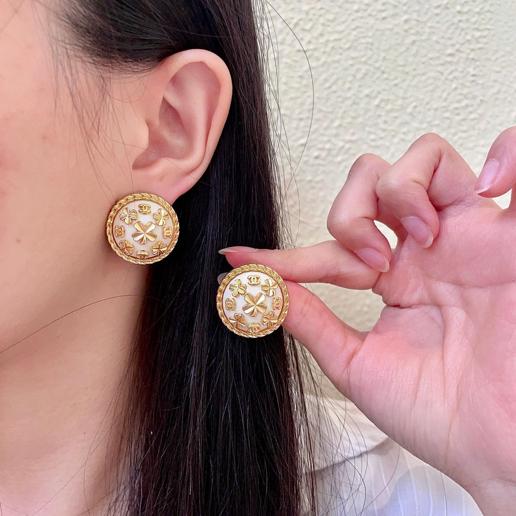 Chanel Interlocking C Camellia Stud Earrings - album image 1