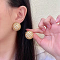 Chanel Interlocking C Camellia Stud Earrings - album image 1