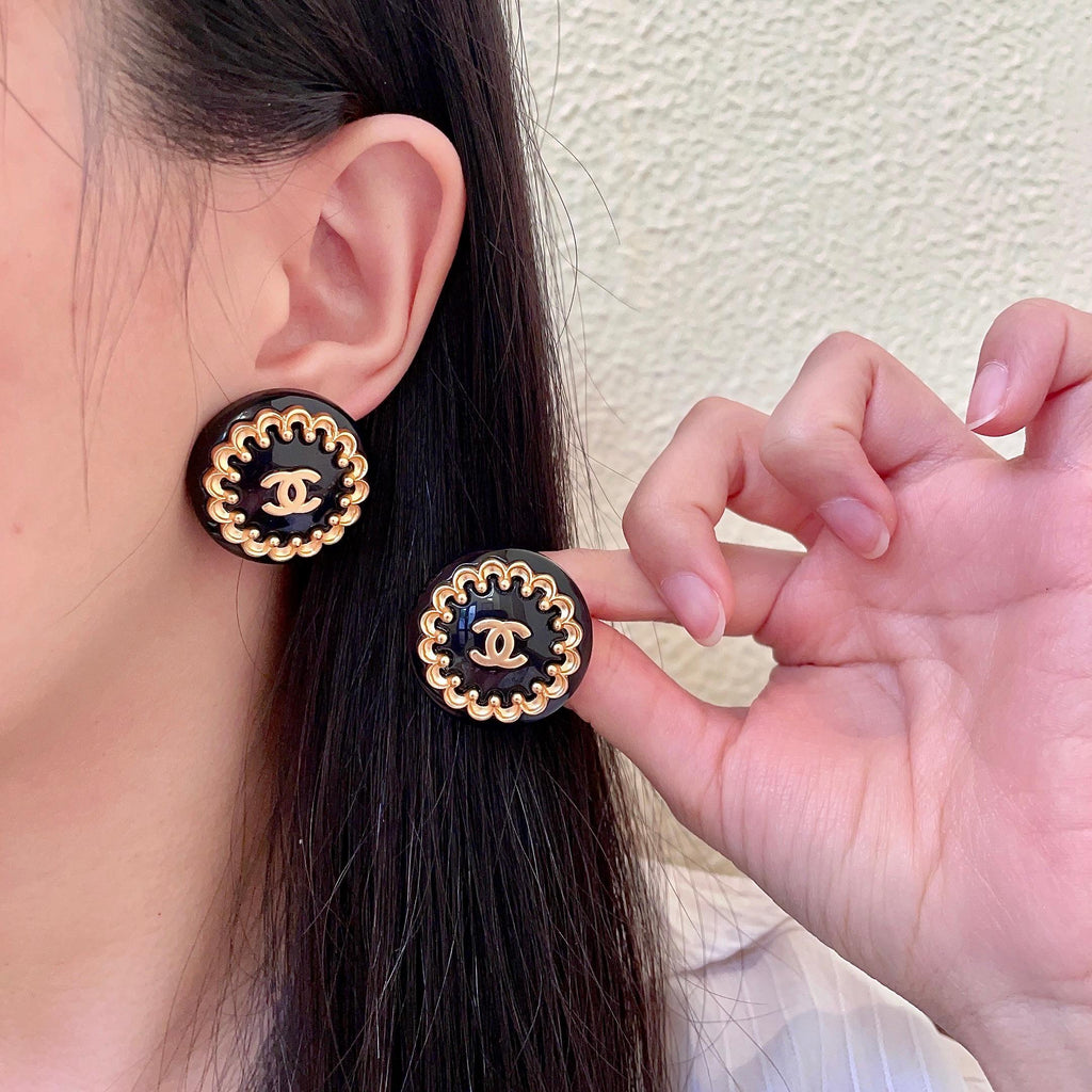 Chanel Interlocking C Stud Earrings - album image 1