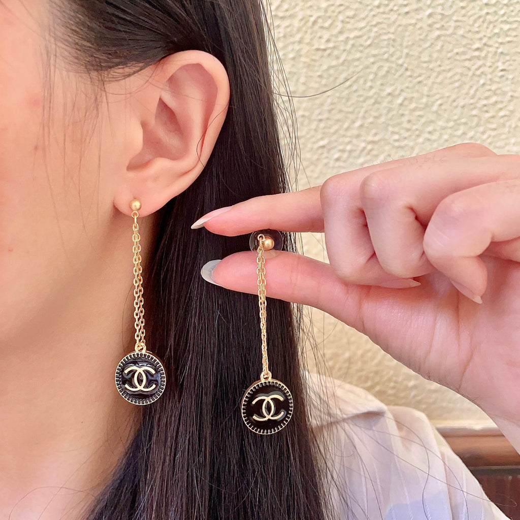 Chanel Interlocking C Earrings - album image 1