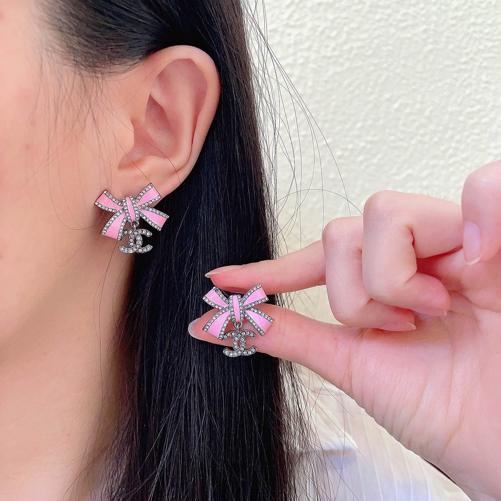 Chanel Interlocking C Bow Butterfly Crystal Accent Earrings - album image 1
