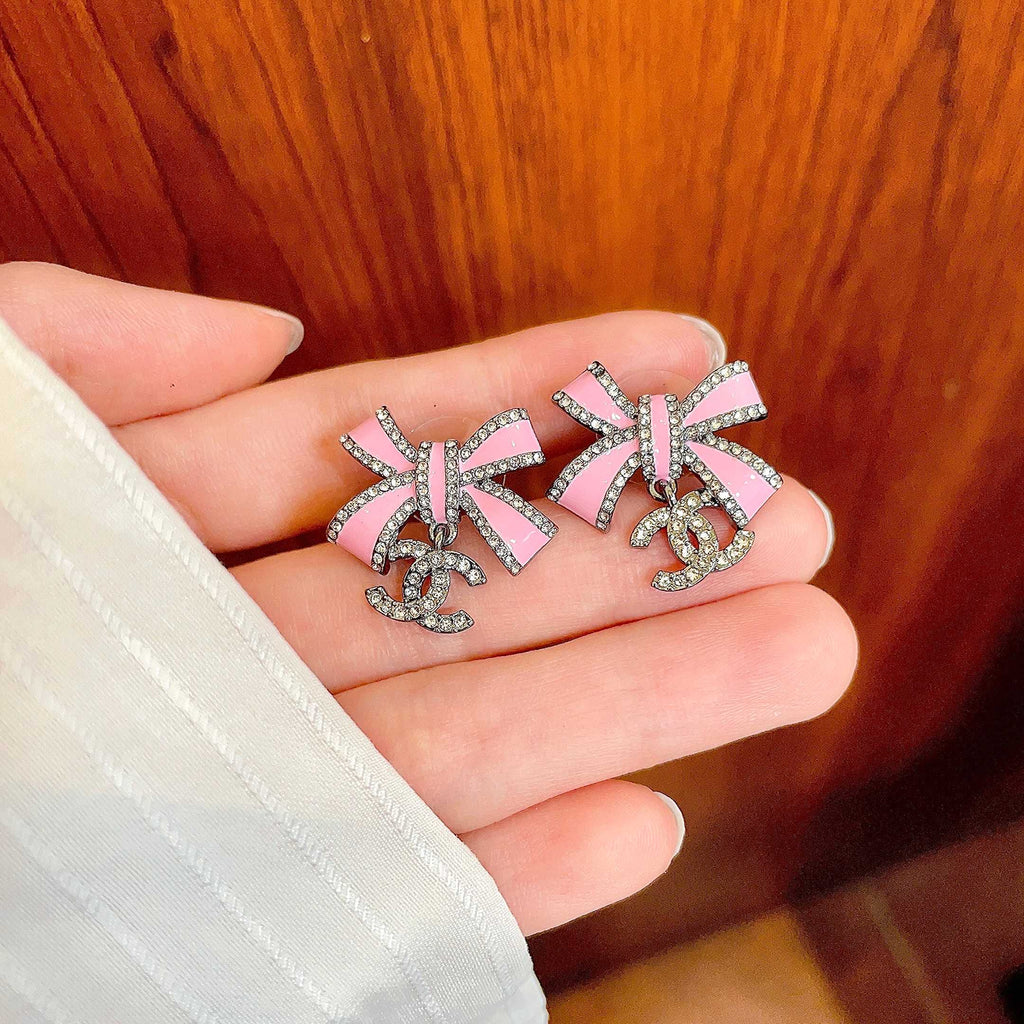 Chanel Interlocking C Bow Butterfly Crystal Accent Earrings - album image 4