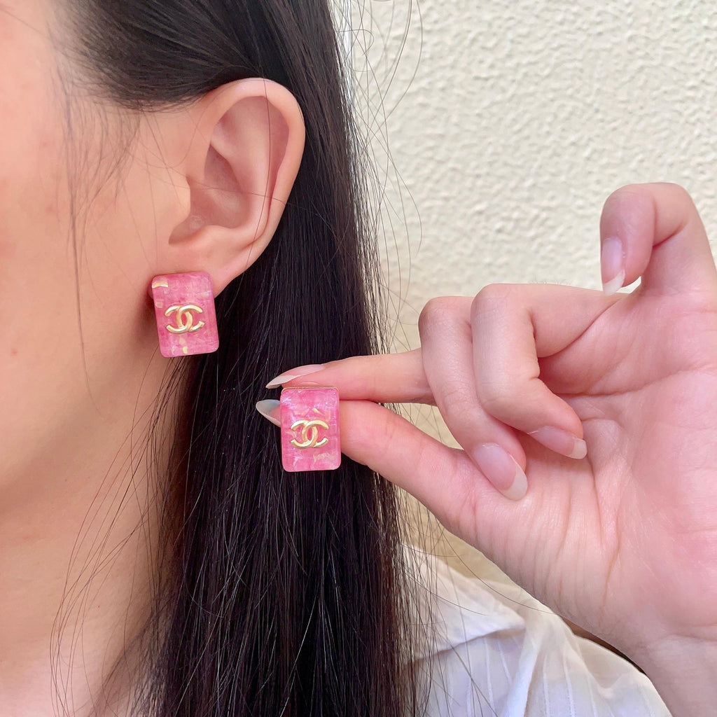 Chanel Interlocking C Stud Earrings - album image 1
