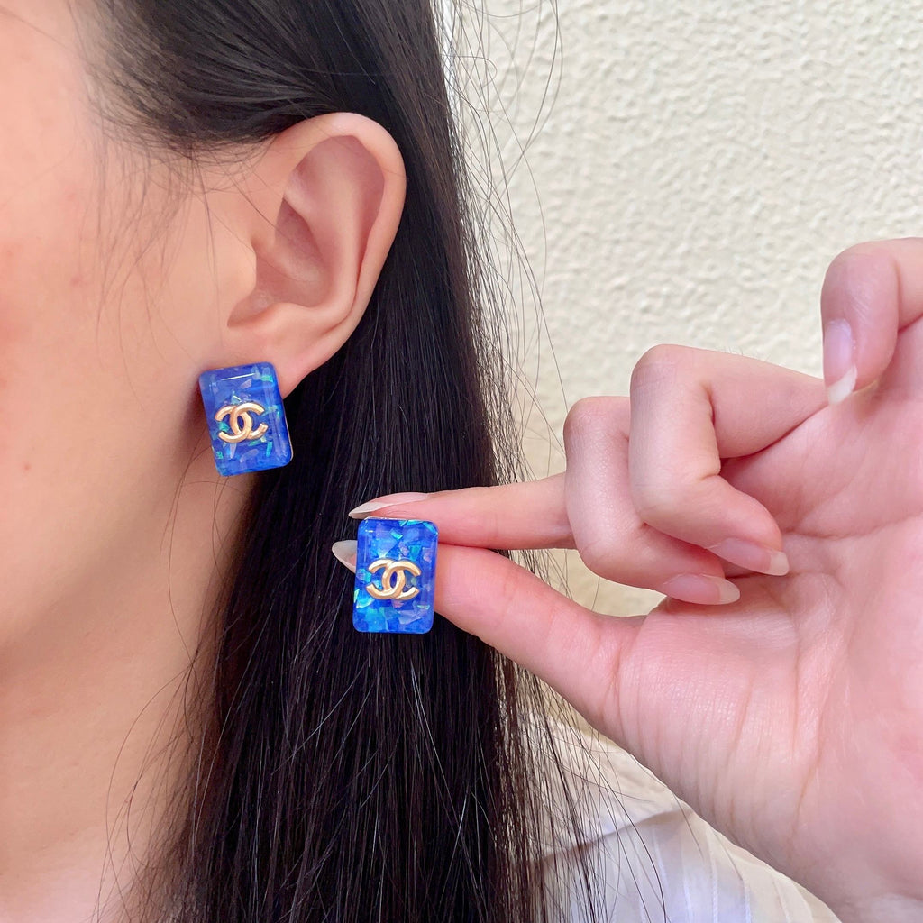 Chanel Interlocking C Stud Earrings - album image 1
