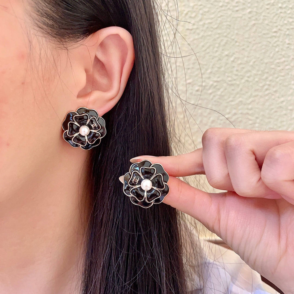 Chanel Interlocking C Camellia Stud Earrings - album image 1