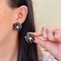 Chanel Interlocking C Camellia Stud Earrings - album image 1