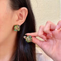 Chanel Interlocking C Stud Earrings - album image 1