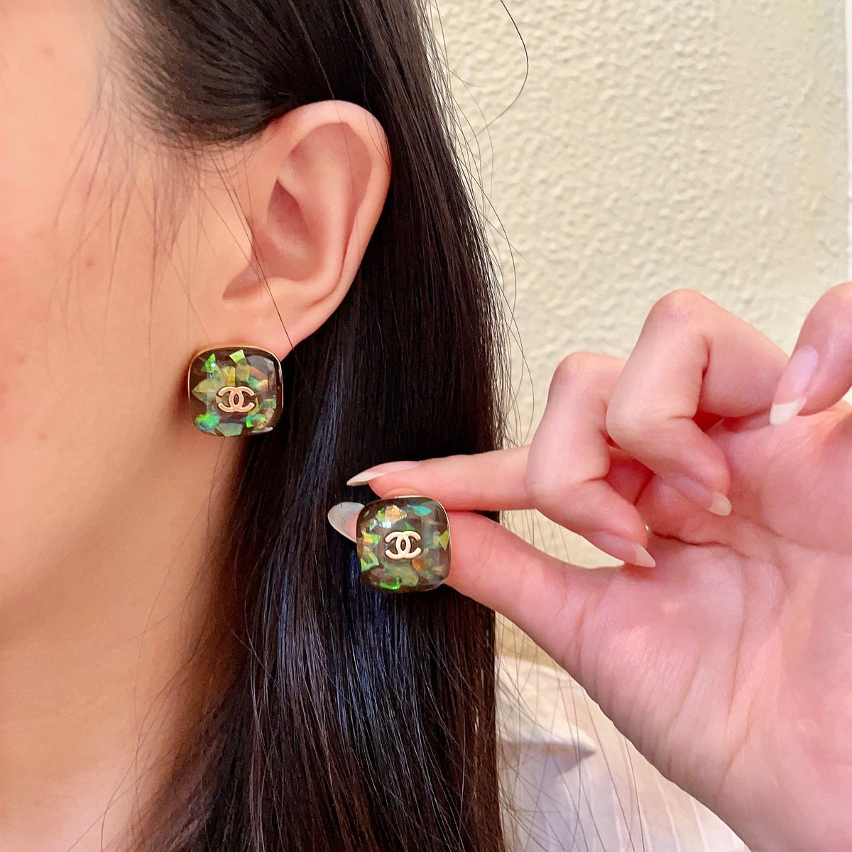 Chanel Interlocking C Stud Earrings - album image 1