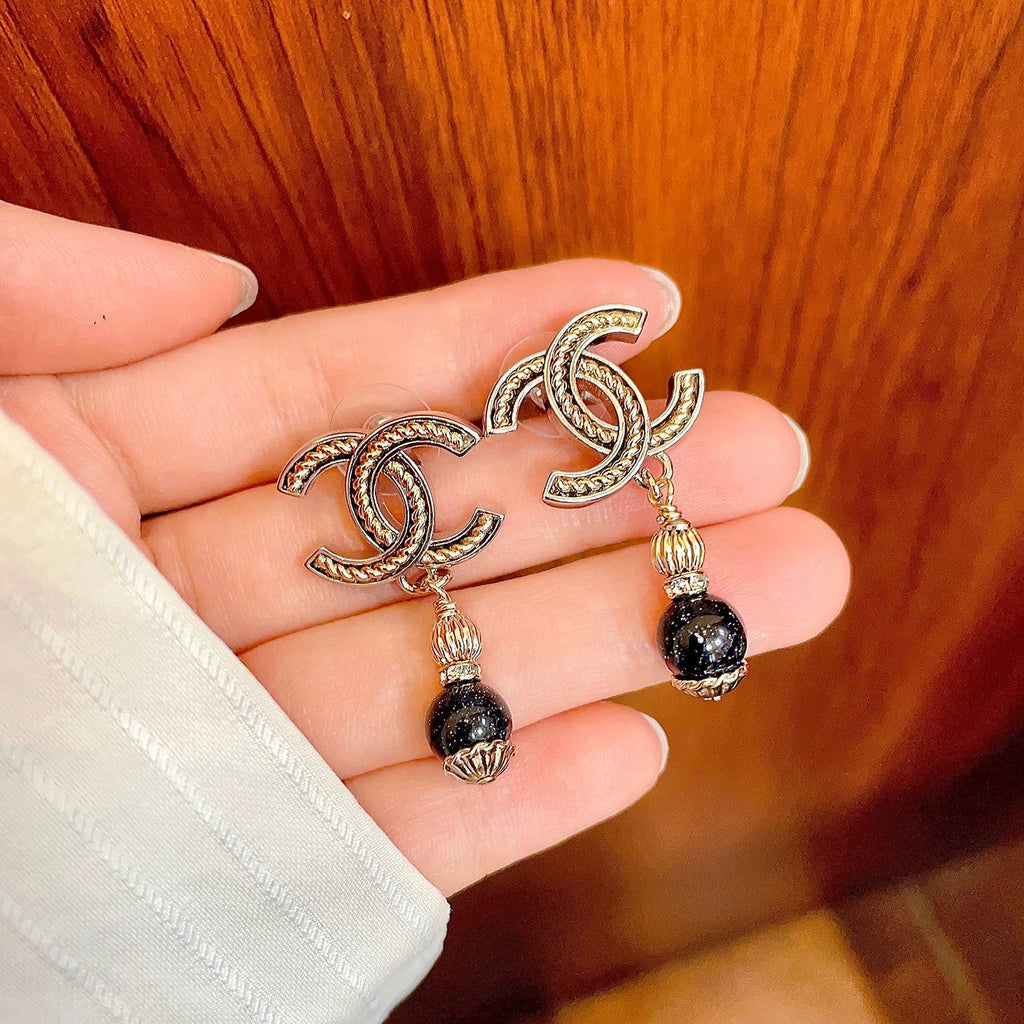 Chanel Interlocking C Earrings - album image 4