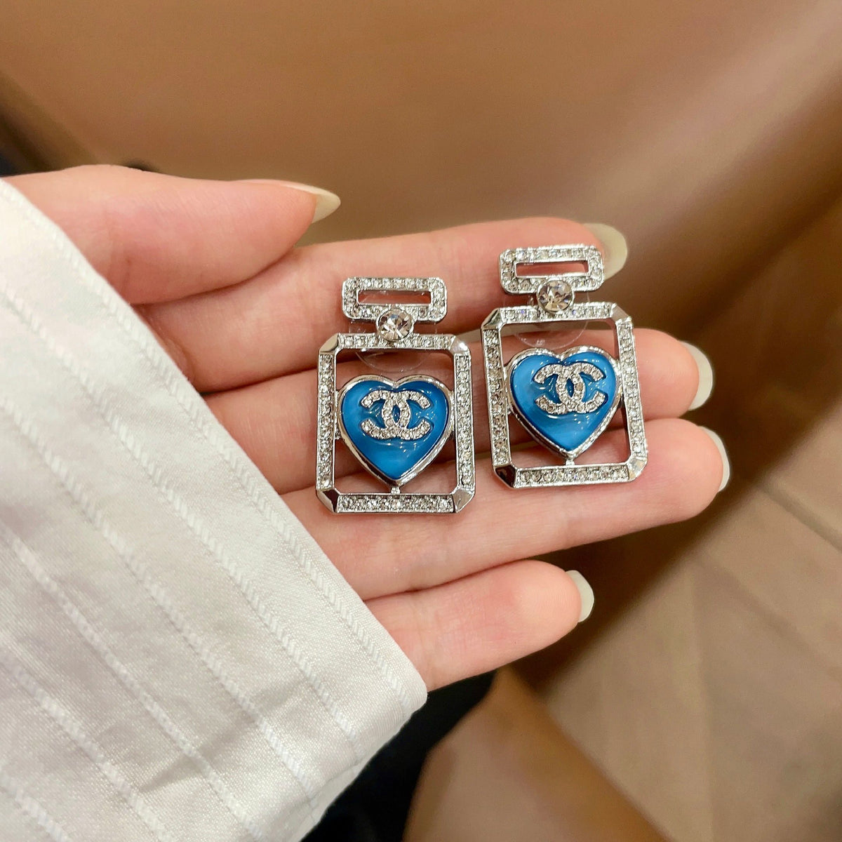 Chanel Interlocking C Heart Stud Earrings - album image 4