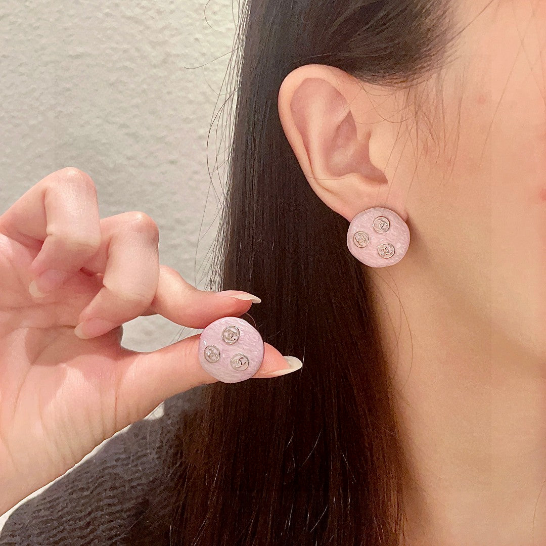 Chanel Interlocking C Stud Earrings - album image 1