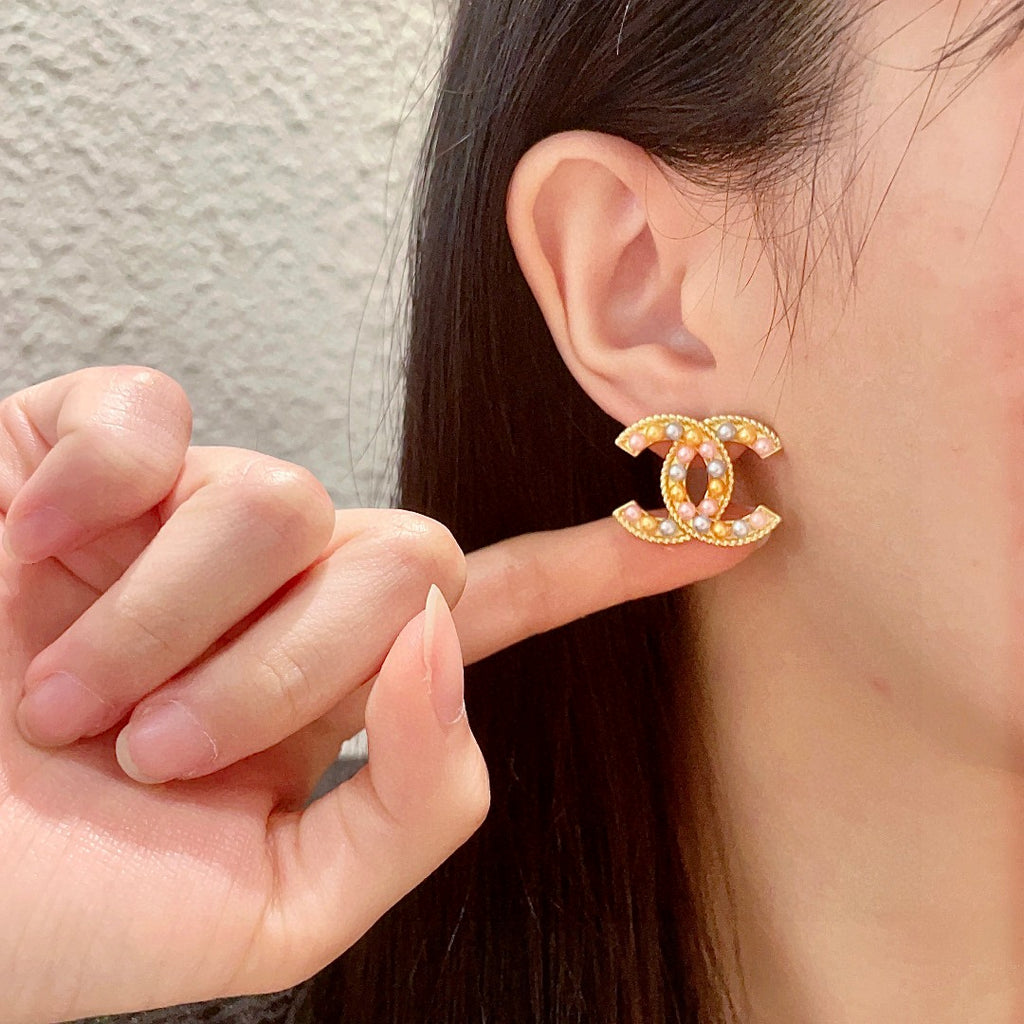 Chanel Interlocking C Stud Earrings - album image 2