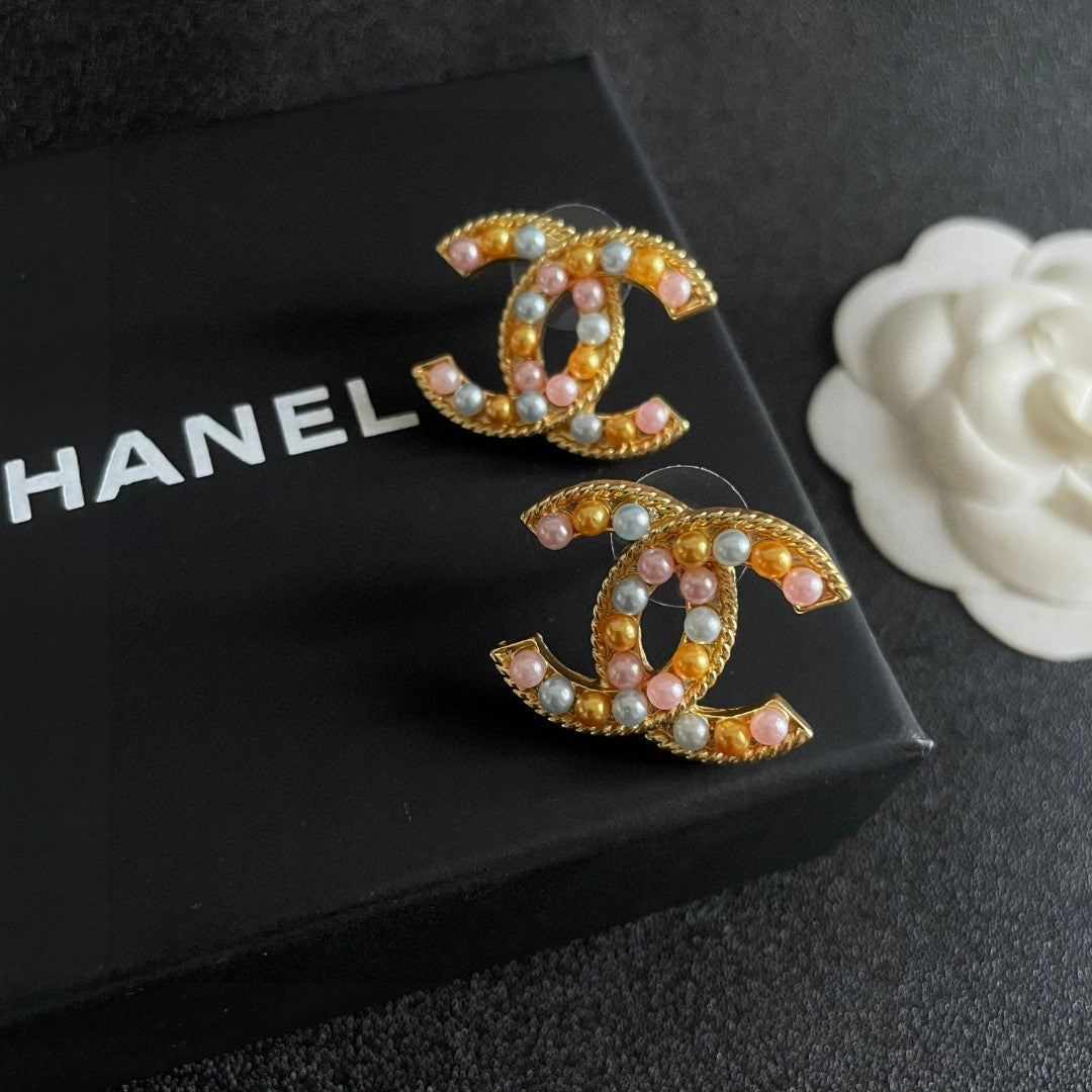 Chanel Interlocking C Stud Earrings - album image 9