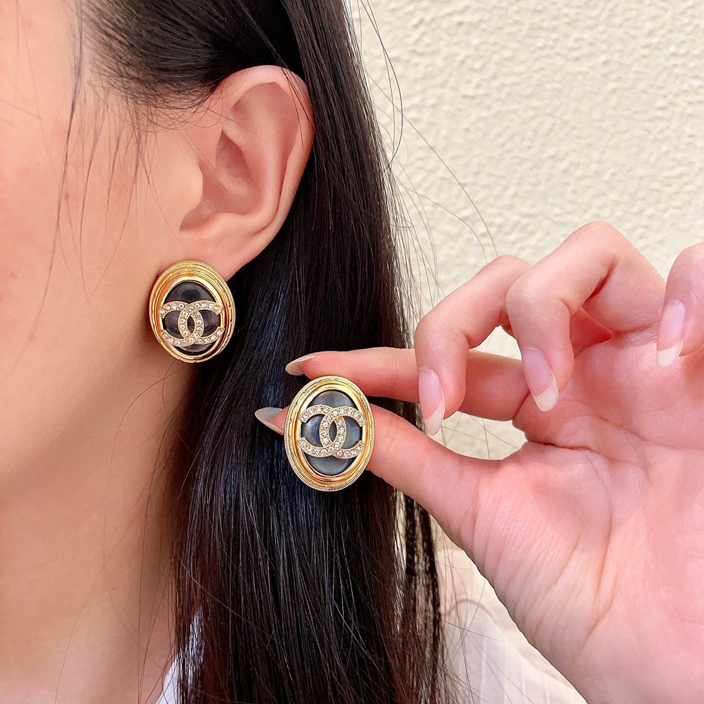 Chanel Interlocking C Crystal Accent Stud Earrings - album image 1