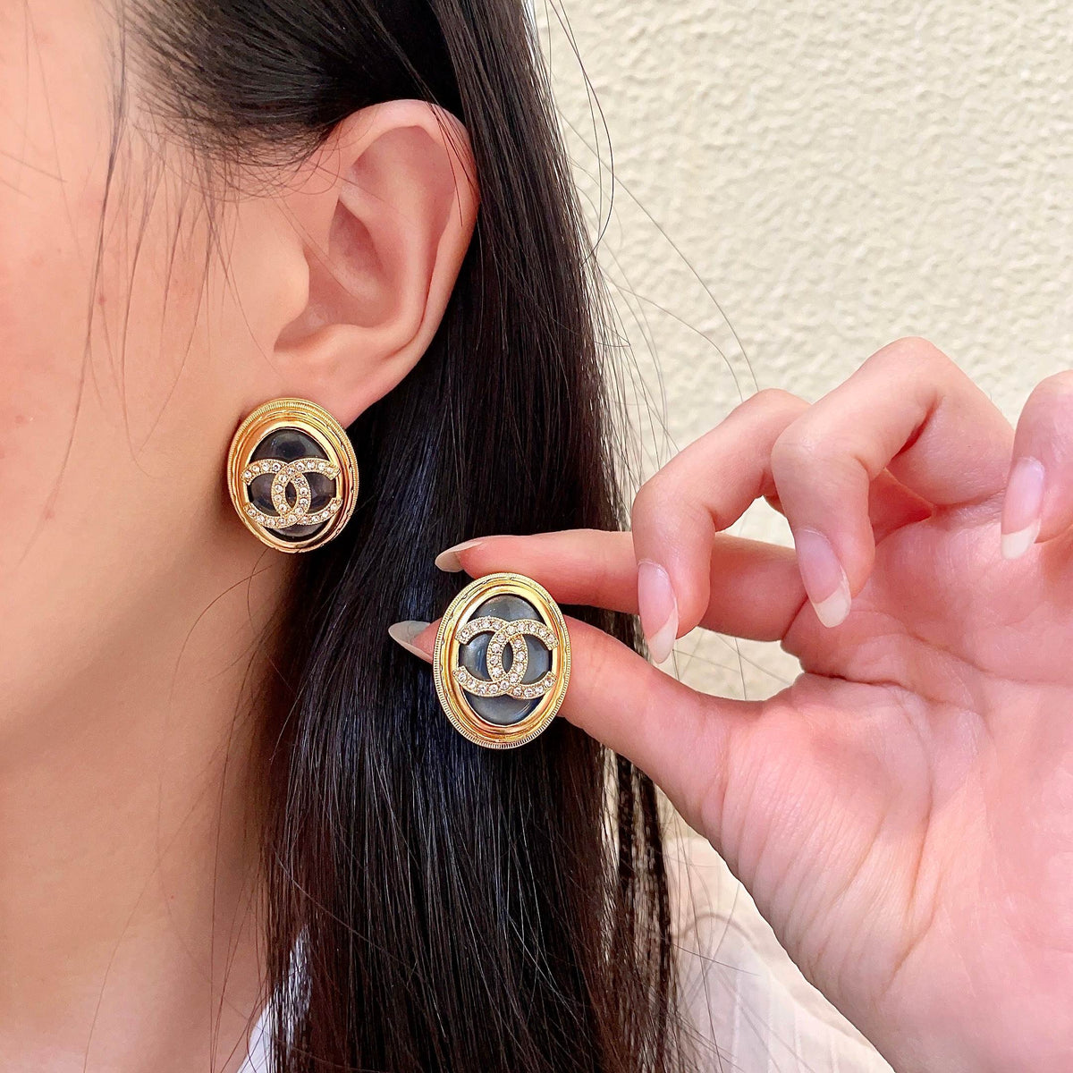 Chanel Interlocking C Crystal Accent Stud Earrings - album image 1