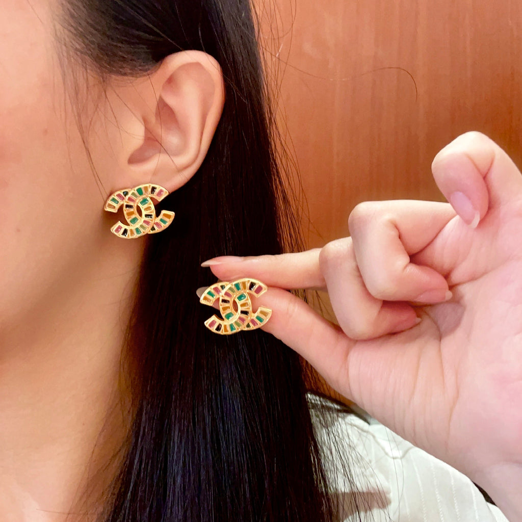 Chanel Interlocking C Stud Earrings - album image 1
