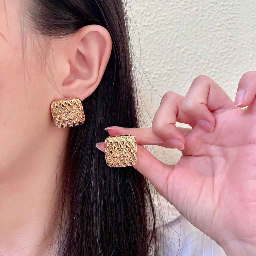 Chanel Interlocking C Stud Earrings - album image 1