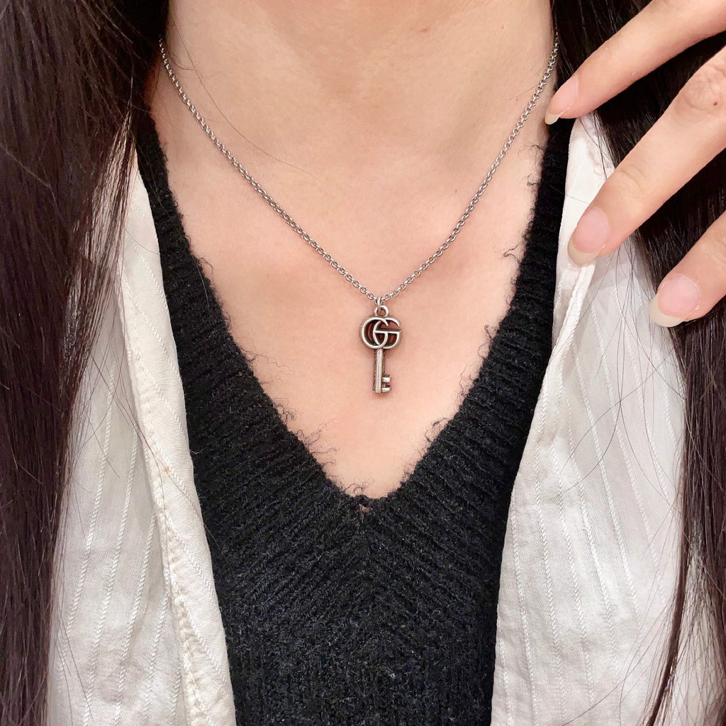 Gucci Interlocking G Key Necklace - album image 1