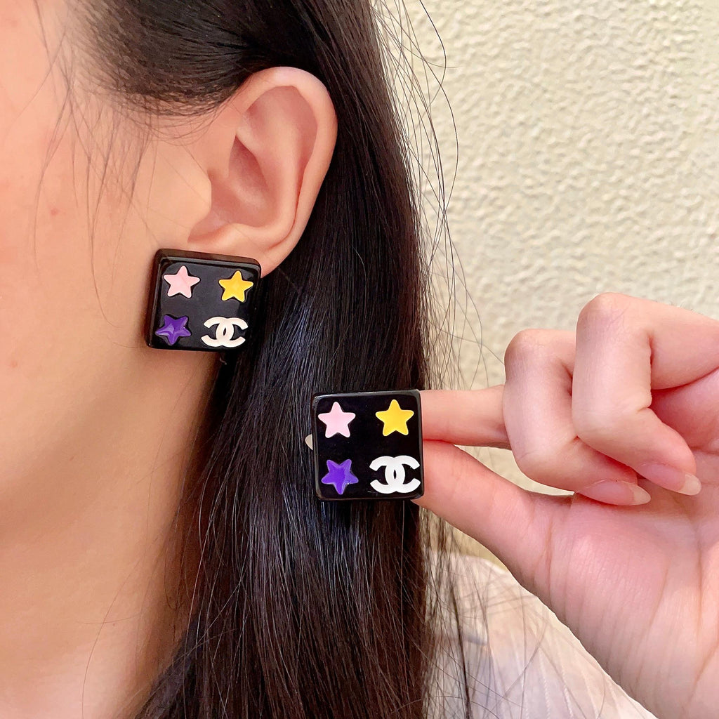 Chanel Interlocking C Star Stud Earrings - album image 1
