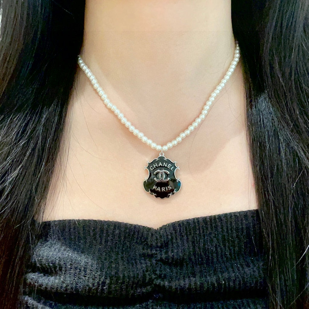 Chanel Interlocking C Pearl Letter Necklace - album image 3