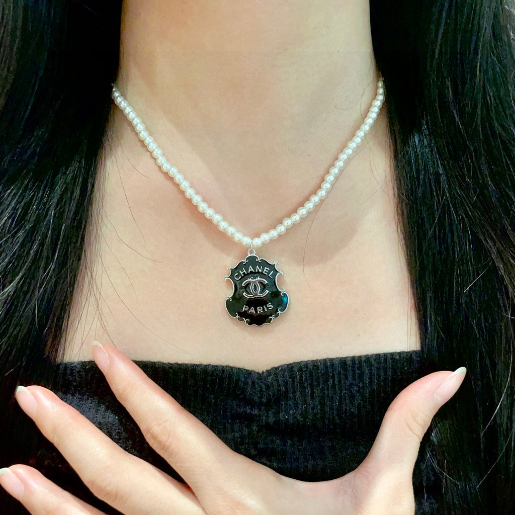 Chanel Interlocking C Pearl Letter Necklace - album image 2