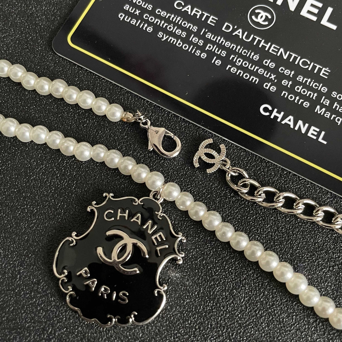 Chanel Interlocking C Pearl Letter Necklace - album image 7