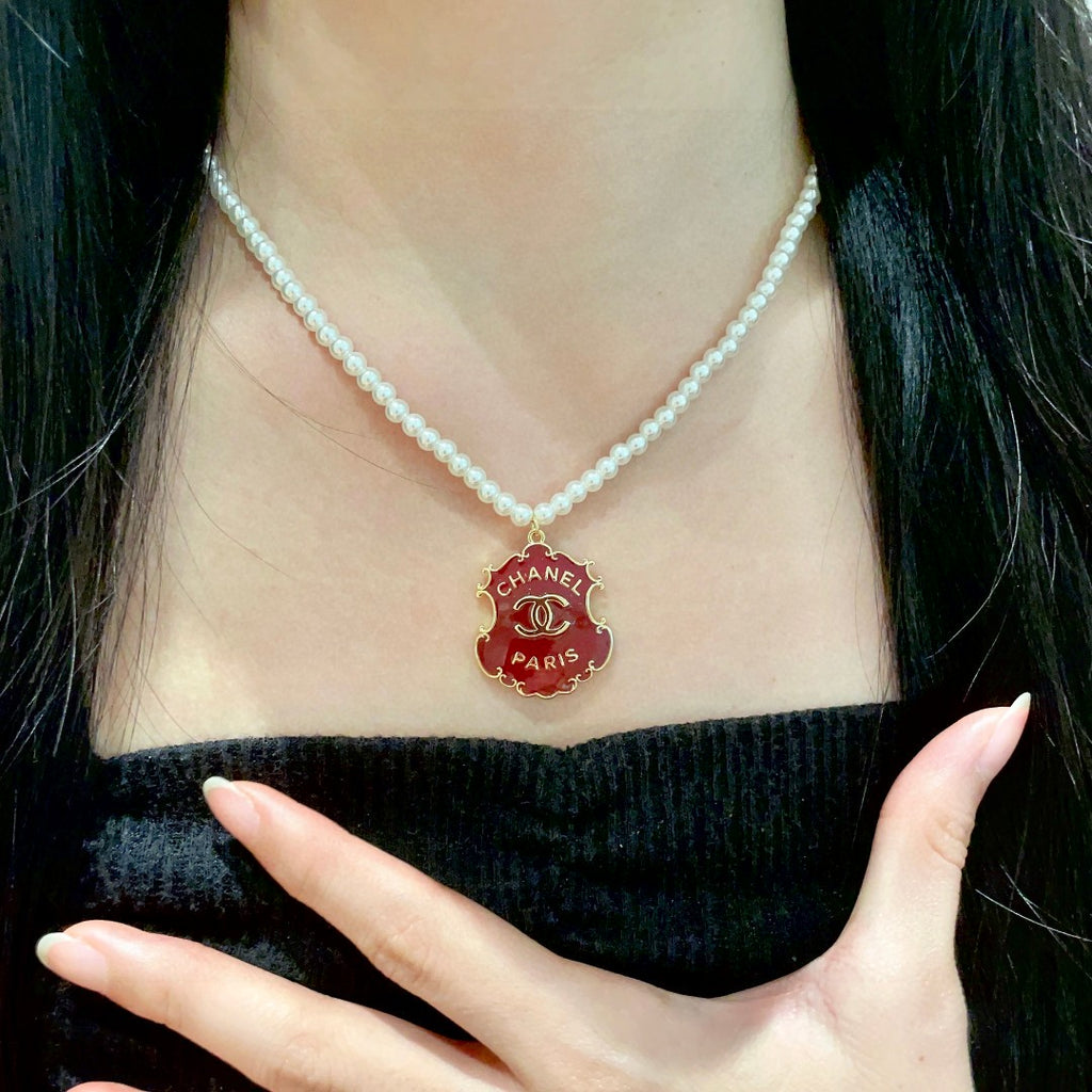 Chanel Interlocking C Pearl Letter Necklace - album image 2