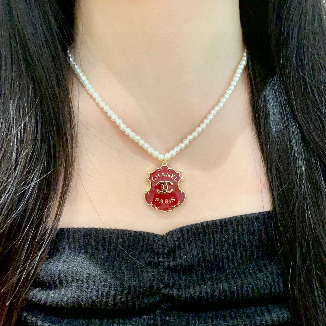 Chanel Interlocking C Pearl Letter Necklace - album image 3
