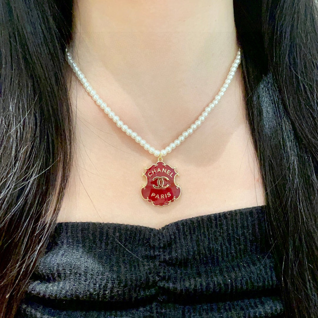 Chanel Interlocking C Pearl Letter Necklace - album image 3